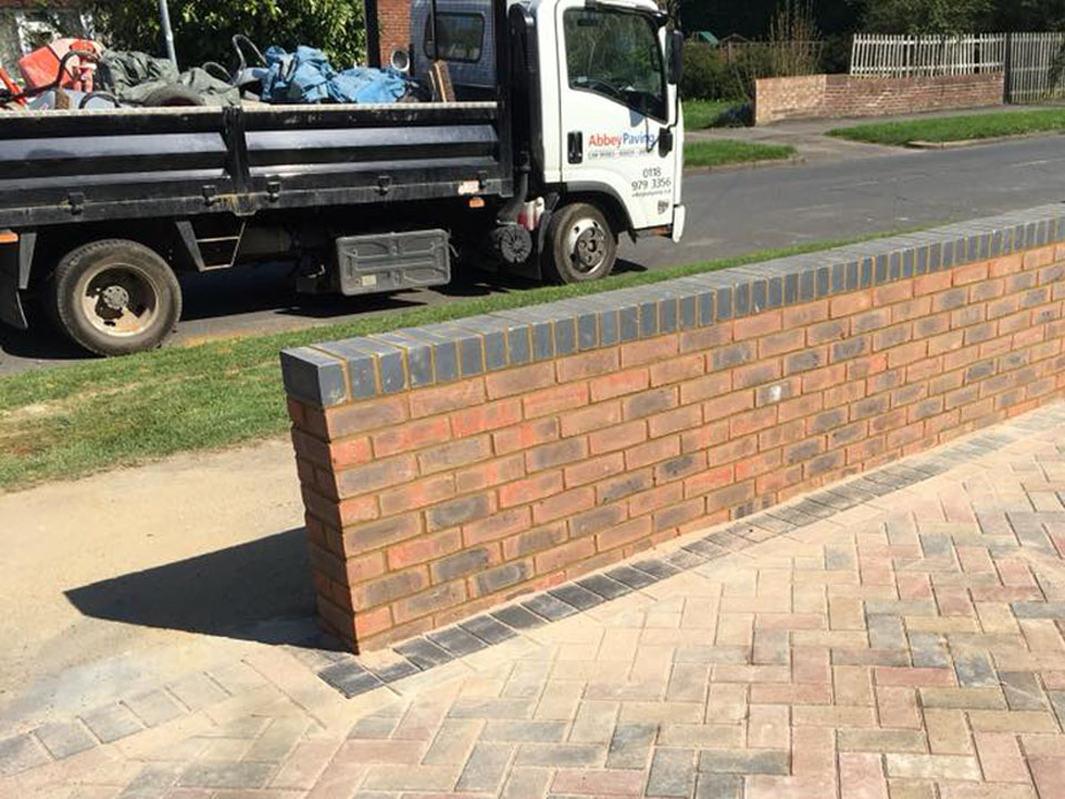 Brick wall by Abbey Paving Team